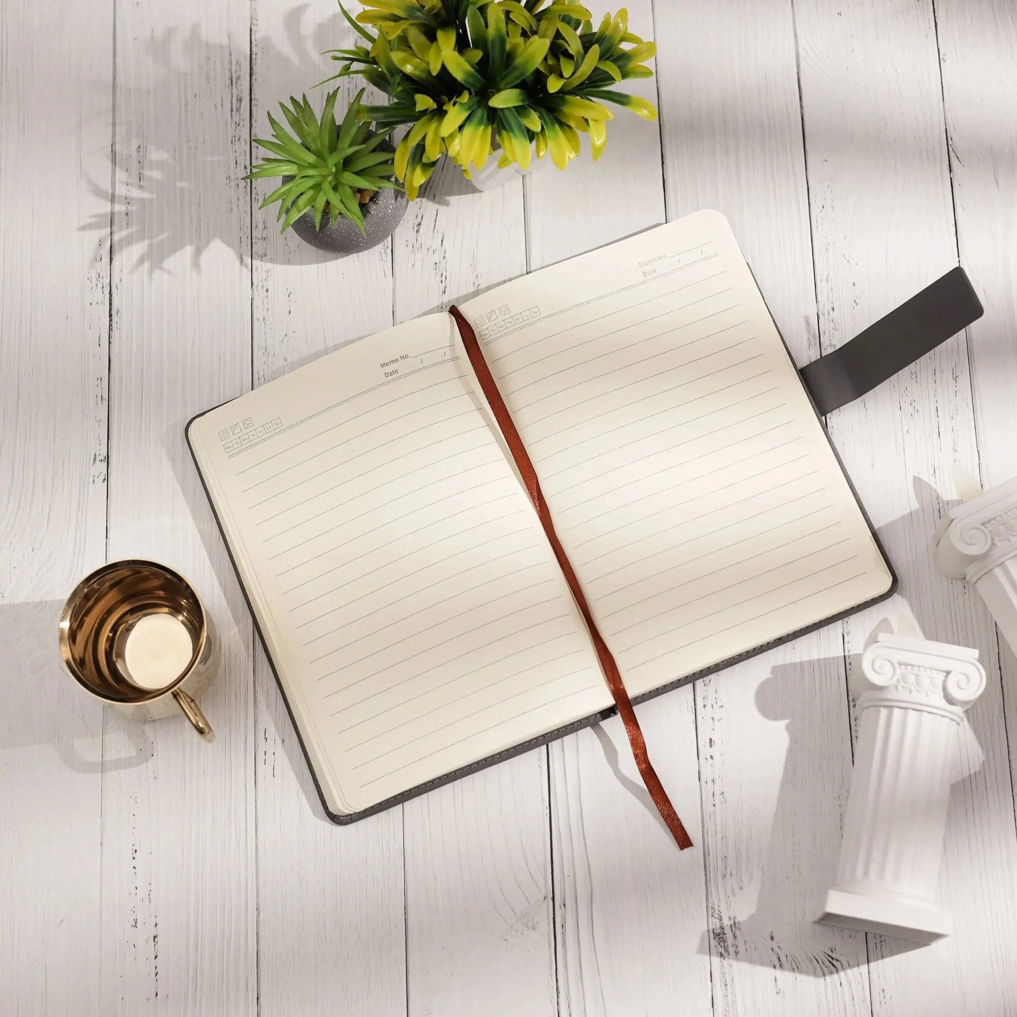 Elegant Gray Leather Notebook with Decorative Border and Strap Closure thumbnail 2